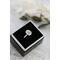 Sterling silver ring with oval faceted moonstone set in a bezel setting with simple silver ring band. 